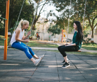 friends talking at park