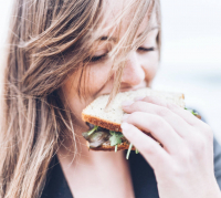 girl eating sandwich