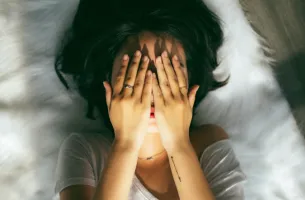 healthy girl sad hands on face
