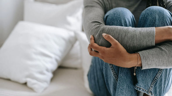Girl jeans and grey sweater